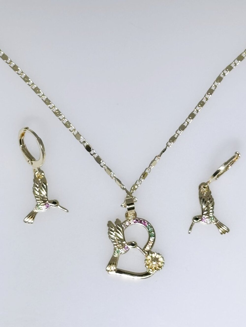 Gold tone delicate hummingbird theme jewelry set, necklace, earrings, NWOT